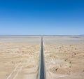 Straight road through the wind erosion physiognomy in qinghai Royalty Free Stock Photo