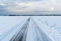 Straight road in a wintry landscape Royalty Free Stock Photo