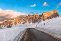 Straight stretch of a mountain pass road in the Alps in winter Royalty Free Stock Photo