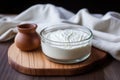 strained yogurt in a cheesecloth for greek yogurt