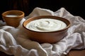 strained yogurt in a cheesecloth for greek yogurt