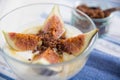 Strained yogurt with sliced figs and honey