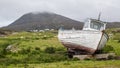 Stranded boat on a Scottish green field. Royalty Free Stock Photo