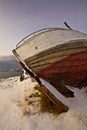 Stranded old fishing boat