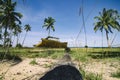 Shipwrecked on the sandy beach over cloudy sky background at sunny day