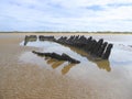 Stranded wreck of a wooden barque