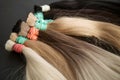 strands of natural women& x27;s hair for encapsulation and extension in a beauty salon. Royalty Free Stock Photo