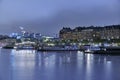 StrandvÃÂ¤gen in Stockholm at night with beautiful residential houses its alley and boats at the quay Royalty Free Stock Photo