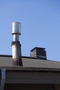 A strange chimney on the roof of a culture house