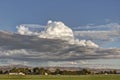 An unusual cloud formation over farmland