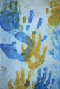 Strange Colorful Hands Prints Over White Background. Royalty Free Stock Photo