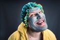Strange man with face pack Royalty Free Stock Photo