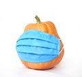 A strange photo of a pumpkin with a blue mask