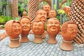 The strange pots sculpture look like human face in Nong Nooch tropical garden in Pattaya Royalty Free Stock Photo