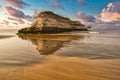 Golden beach and unusual rock in harente Maritime France