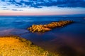 Strange Rocky Shoreline Sunset Royalty Free Stock Photo