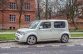 Strange ugly Japanese Nissan Cube car parked left side view