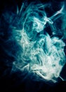 Strangely shaped puff of blue smoke Royalty Free Stock Photo