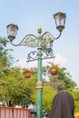 strangers in the walkside beside lamp Royalty Free Stock Photo