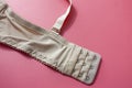 Straps and hooks of beige women push up bra. Lingerie concept Royalty Free Stock Photo