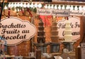 View of delicious chocolate fountains at a market stall in the Christmas market in Strasbourg