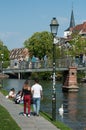 Couple walking in border Il river at little France quarter Royalty Free Stock Photo