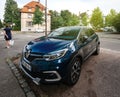 Beautiful French Renault car parked in city