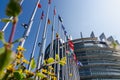 Strasbourg, France. August 2019.The entrance to the modern seat of the European parliament. A row of flagpoles with the flags of