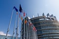 Strasbourg, France. August 2019.The entrance to the modern seat of the European parliament. A row of flagpoles with the flags of