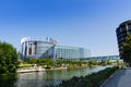 Strasbourg, France, August 2019. Nice view of the rear of the European Parliament building. The River Ill frames the modern metal Royalty Free Stock Photo