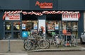 Entrance to Auchan French ssupermarket in city with people