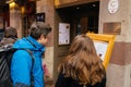 Couple reading menu of the iconic alsatian Winstub Meiselocker