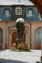 STRASBOURG, FRANCE/EUROPE - JULY 19 : View of a statue three people holding a sphere in a courtyard in Strasbourg France on July