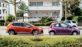 Two Peugeot cars parked street Royalty Free Stock Photo