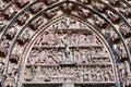 Gothic style tympanum of the main portal of the west facade of famous Strasbourg Cathedral in France Royalty Free Stock Photo