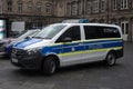 Profile view of german police car parked in the street