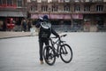 Uber eats delivery man in bicycle waiting in the street