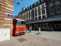 REd Mercedes Benz Actros truck parked in City