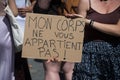 Women protesting for the free abortion with placard in french : mon corps ne vous appartient pas, in english : my body does not be Royalty Free Stock Photo