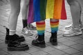 Young woman wearing a rainbow angel wings during the gay pride