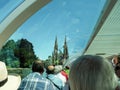 Rear view of passengers tourists. sightseeing through the large glass windows of
