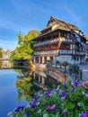 STRASBOURG, FRANCE - June 2019: traditional half timbered houses of Petite France along the picturesque canals Royalty Free Stock Photo