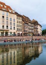 STRASBOURG, FRANCE - June 2019: View on Strasbourg promenade, citizens and tourists having picnic on the river side