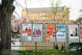 Candidats electoral campaign poster near polling station during first round of