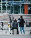 Rear view of journalists waiting in front of European Court for Human Rights