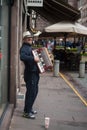 portrait of accordionist playing in the street