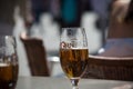 Licorne beer in glass at the restaurat terrace in the street