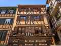 Traditional winstub restaurants in ornate half timbered houses Strasbourg France