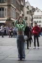 Portrait of asian tourist taking a photo with her smartphone in the street