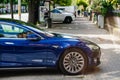 Tesla Model S 90D electric supercar parked in city